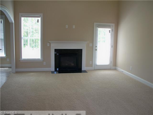 6315 Ridge Haven Road Greensboro, NC 27410 - Photo 4 of 13 Living Room. Vaulted Ceiling, opens to the kitchen