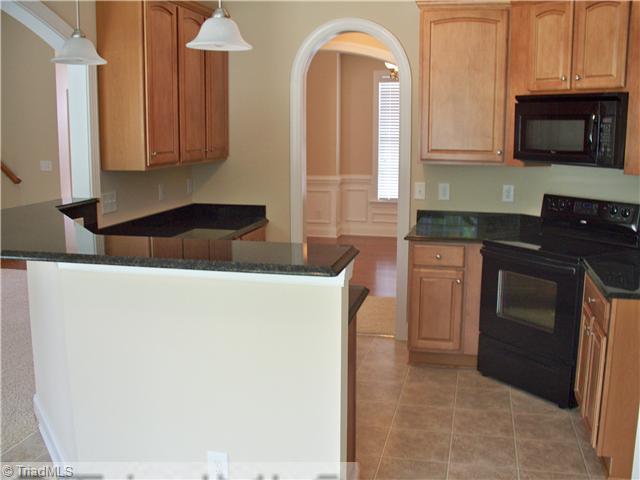 6315 Ridge Haven Road Greensboro, NC 27410 - Photo 7 of 13 Kitchen. Granite Counter Tops