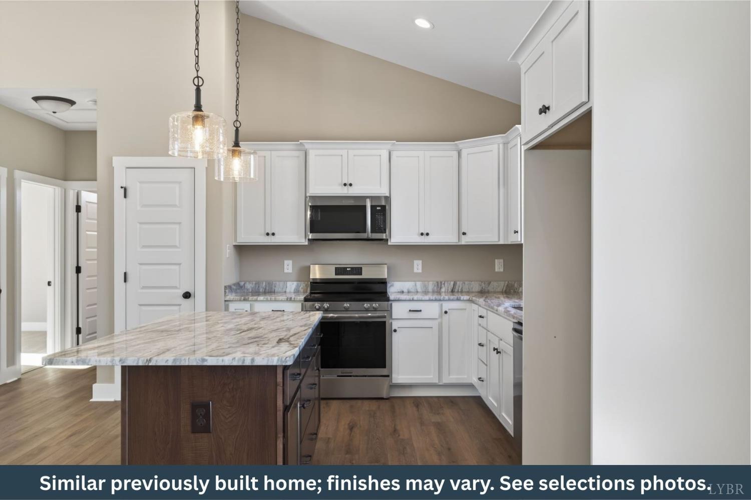 -tbd Francisco Road Farmville, VA 23901 - Photo 5 of 17 a kitchen with stainless steel appliances granite countertop a stove a sink a refrigerator a microwave and white cabinets