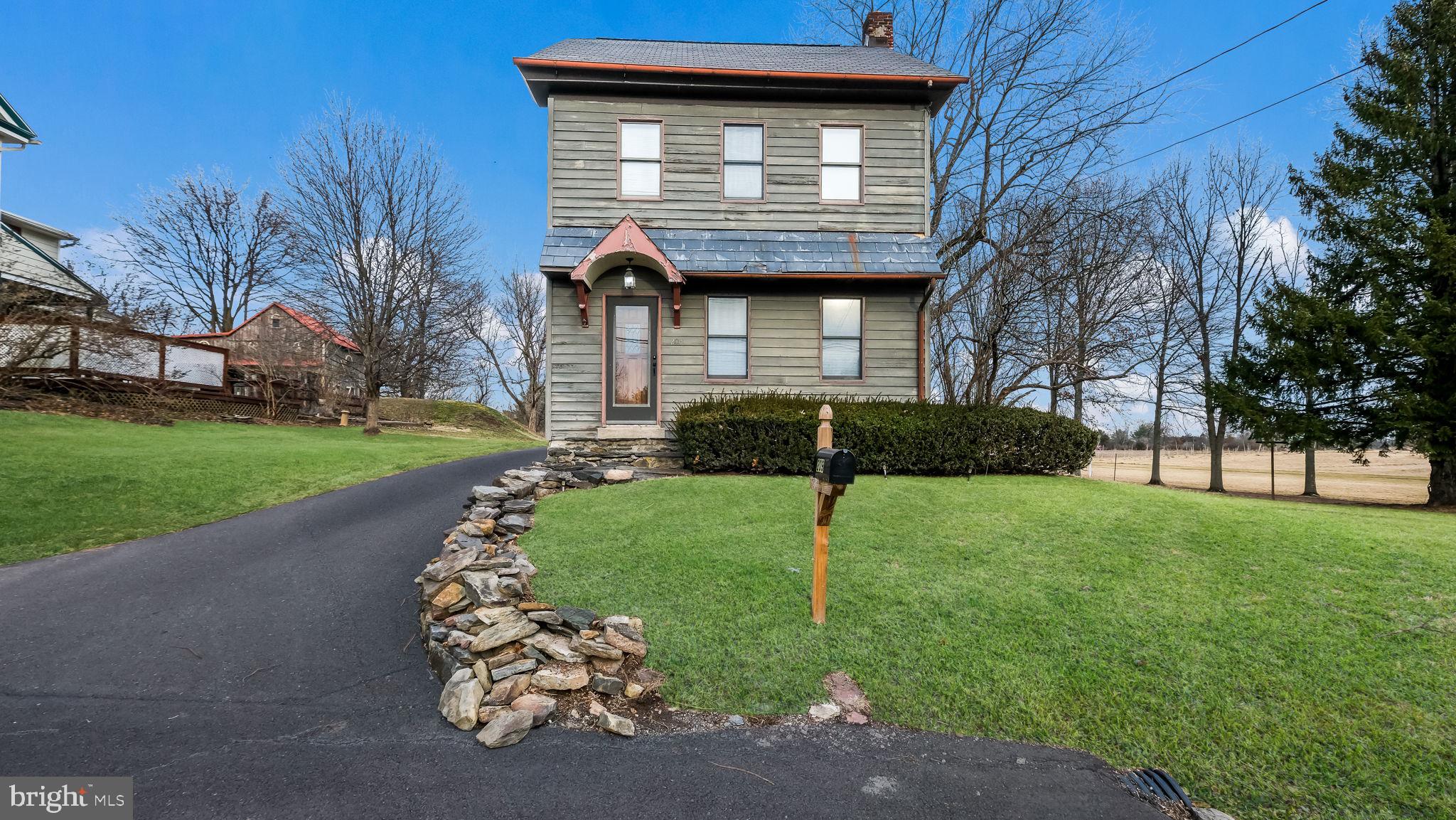 209 Old Bethlehem Road Perkasie, PA 18944 - Photo 1 of 23 a front view of a house with a yard