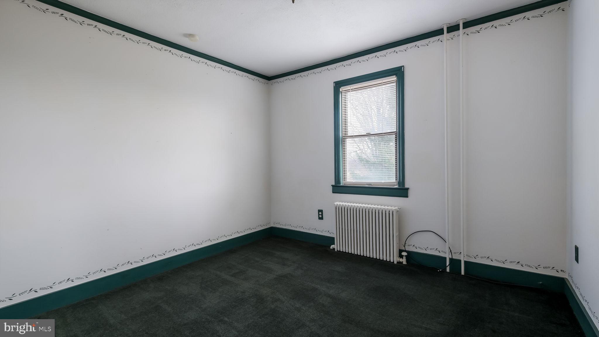 209 Old Bethlehem Road Perkasie, PA 18944 - Photo 17 of 23 an empty room with windows