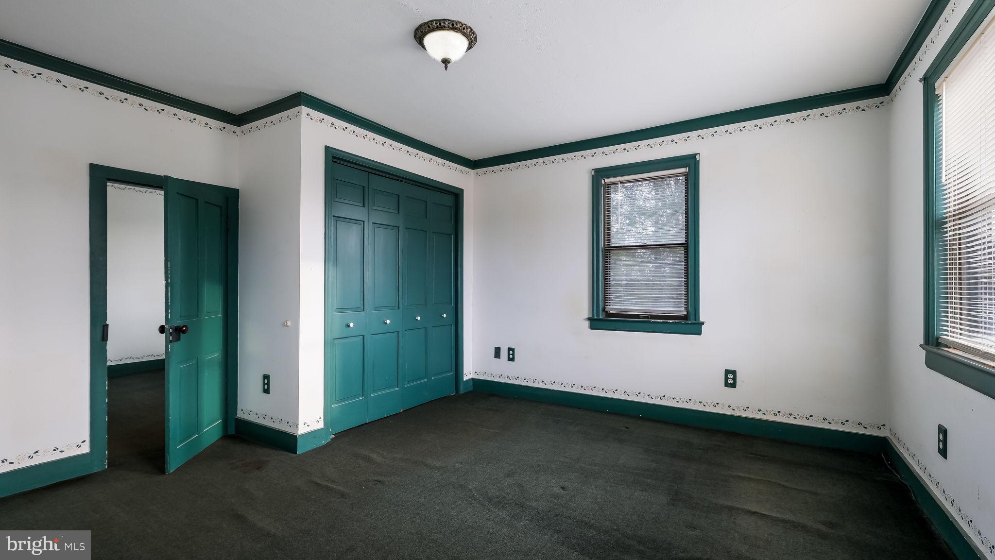 209 Old Bethlehem Road Perkasie, PA 18944 - Photo 18 of 23 an empty room with windows