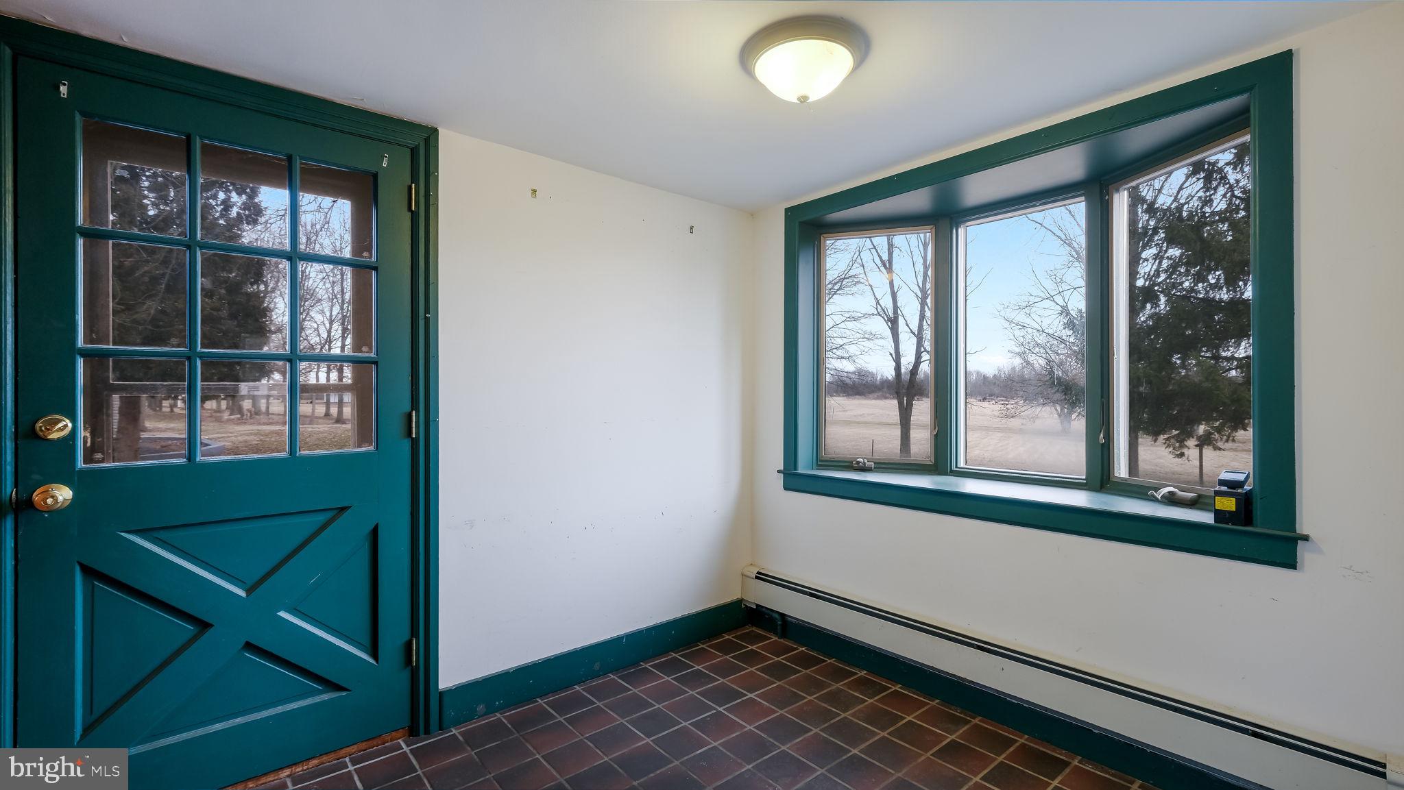 209 Old Bethlehem Road Perkasie, PA 18944 - Photo 6 of 23 a view of a room that has a large window