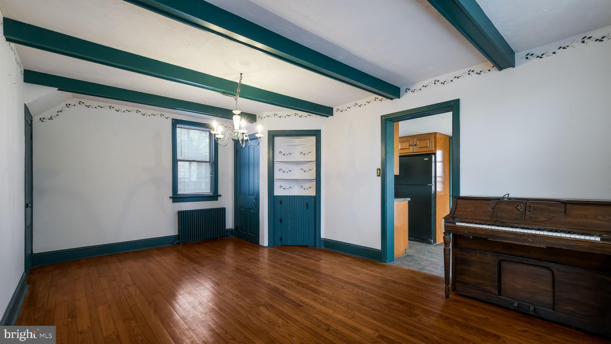 209 Old Bethlehem Road Perkasie, PA 18944 - Photo 10 of 23 a view of empty room with wooden floor and fan