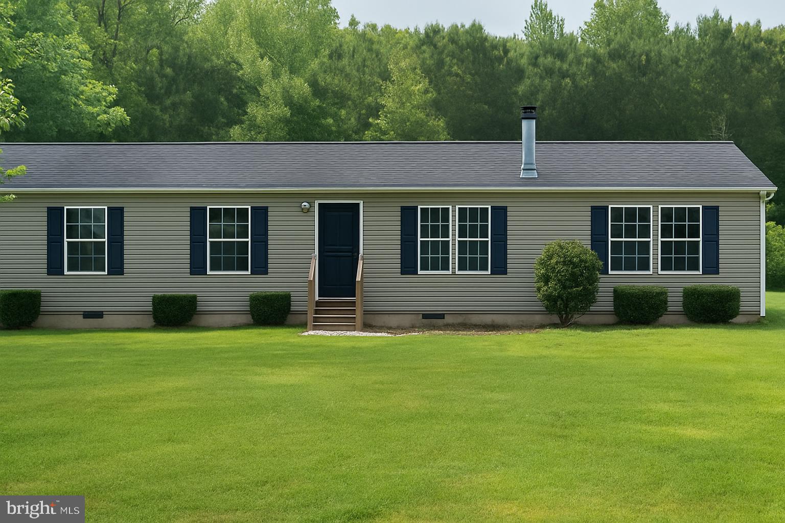 3290 Hartly Road Hartly, DE 19953 - Photo 1 of 13 a front view of a house with a garden