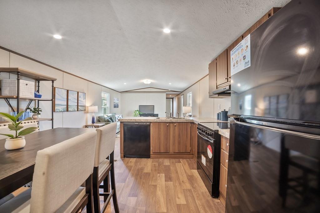 1206 Hayes Road Sherman, TX 75090 - Photo 21 of 21 a kitchen with refrigerator and window