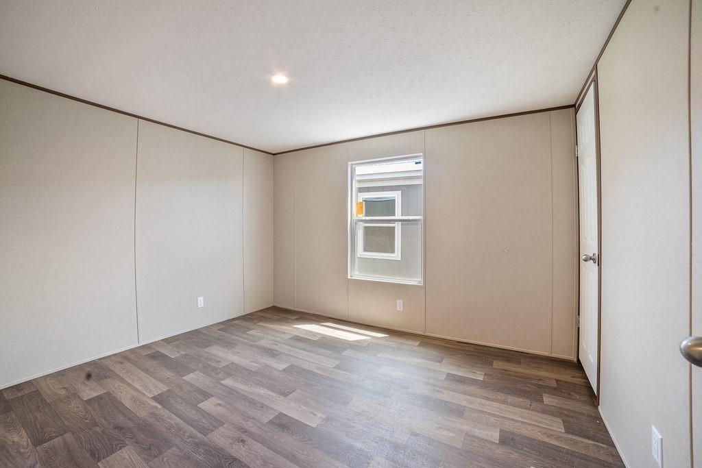 1206 Hayes Road Sherman, TX 75090 - Photo 17 of 21 a view of an empty room with a window