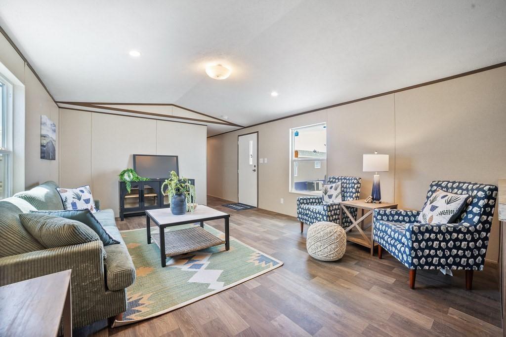 1206 Hayes Road Sherman, TX 75090 - Photo 9 of 21 a living room with furniture and wooden floor
