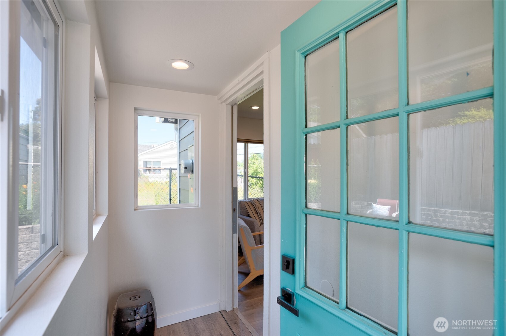 10059 8th Avenue Southwest Seattle, WA 98146 - Photo 15 of 24 a view of an entryway with wooden floor