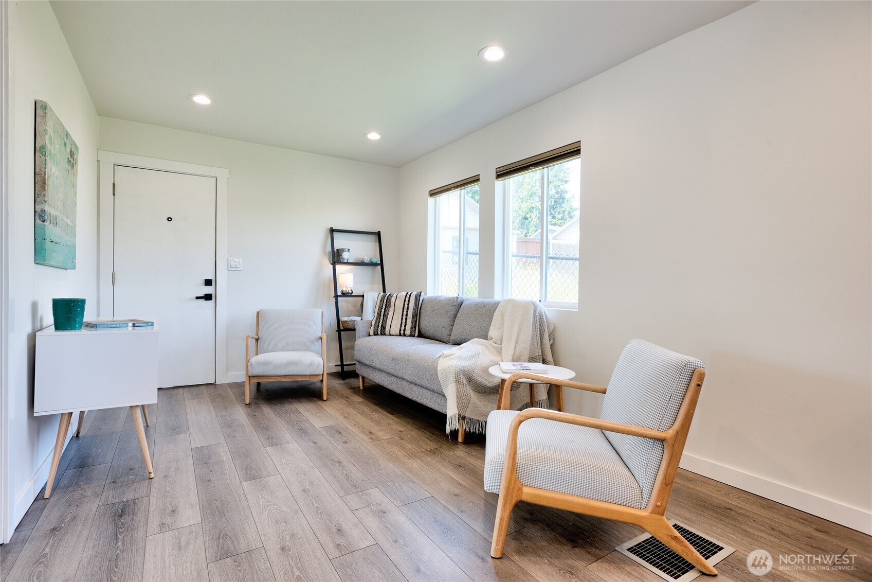 10059 8th Avenue Southwest Seattle, WA 98146 - Photo 6 of 24 a living room with furniture and a wooden floor