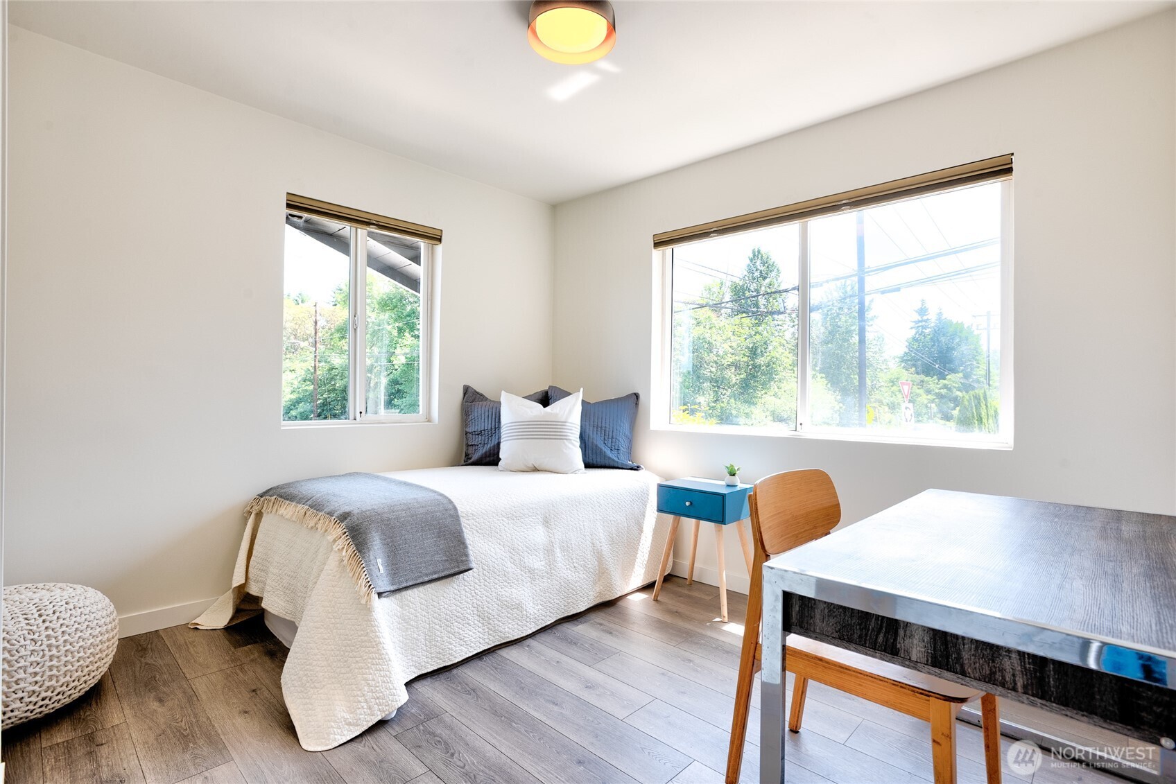 10059 8th Avenue Southwest Seattle, WA 98146 - Photo 8 of 24 a bedroom with a bed and a window