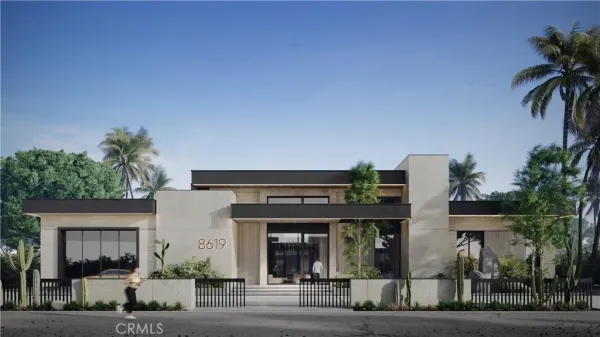 front view of a house with a potted plant