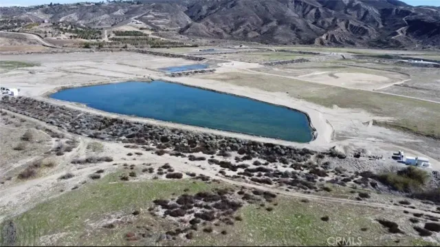 a view of a lake with mountains in the background
