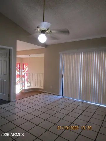 a view of an empty room and window