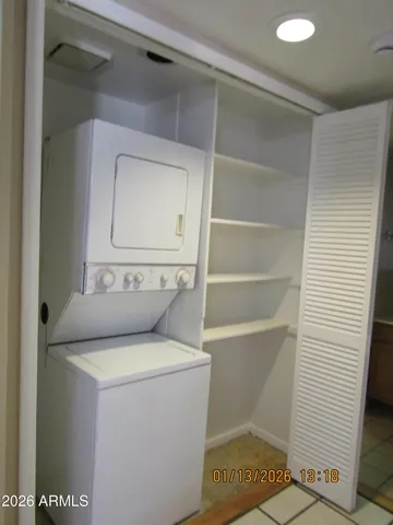 a utility room with a washer and dryer