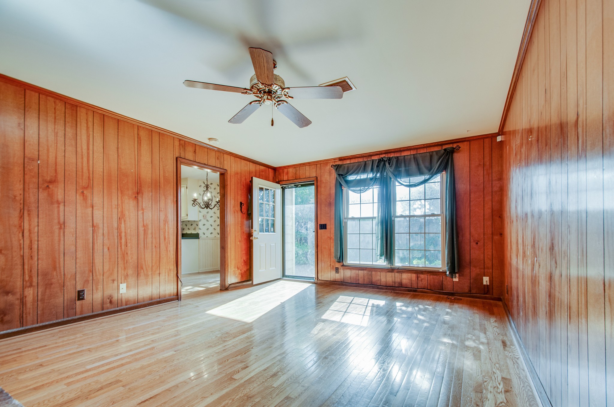 1127 General George Patton Road Nashville, TN 37221 - Photo 15 of 30 wooden floor in an empty room with a window