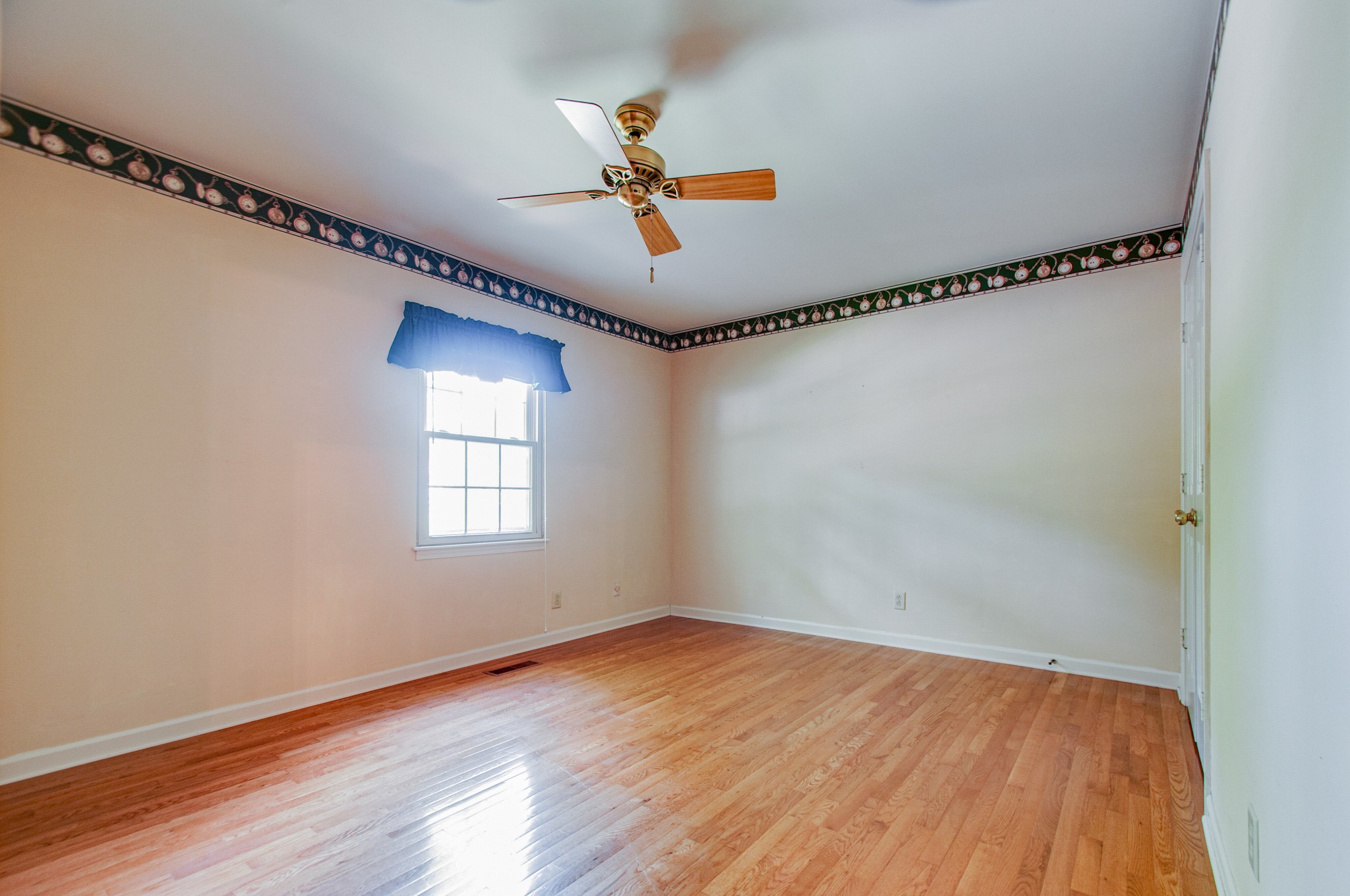 1127 General George Patton Road Nashville, TN 37221 - Photo 23 of 30 a view of a room with wooden floor and fan