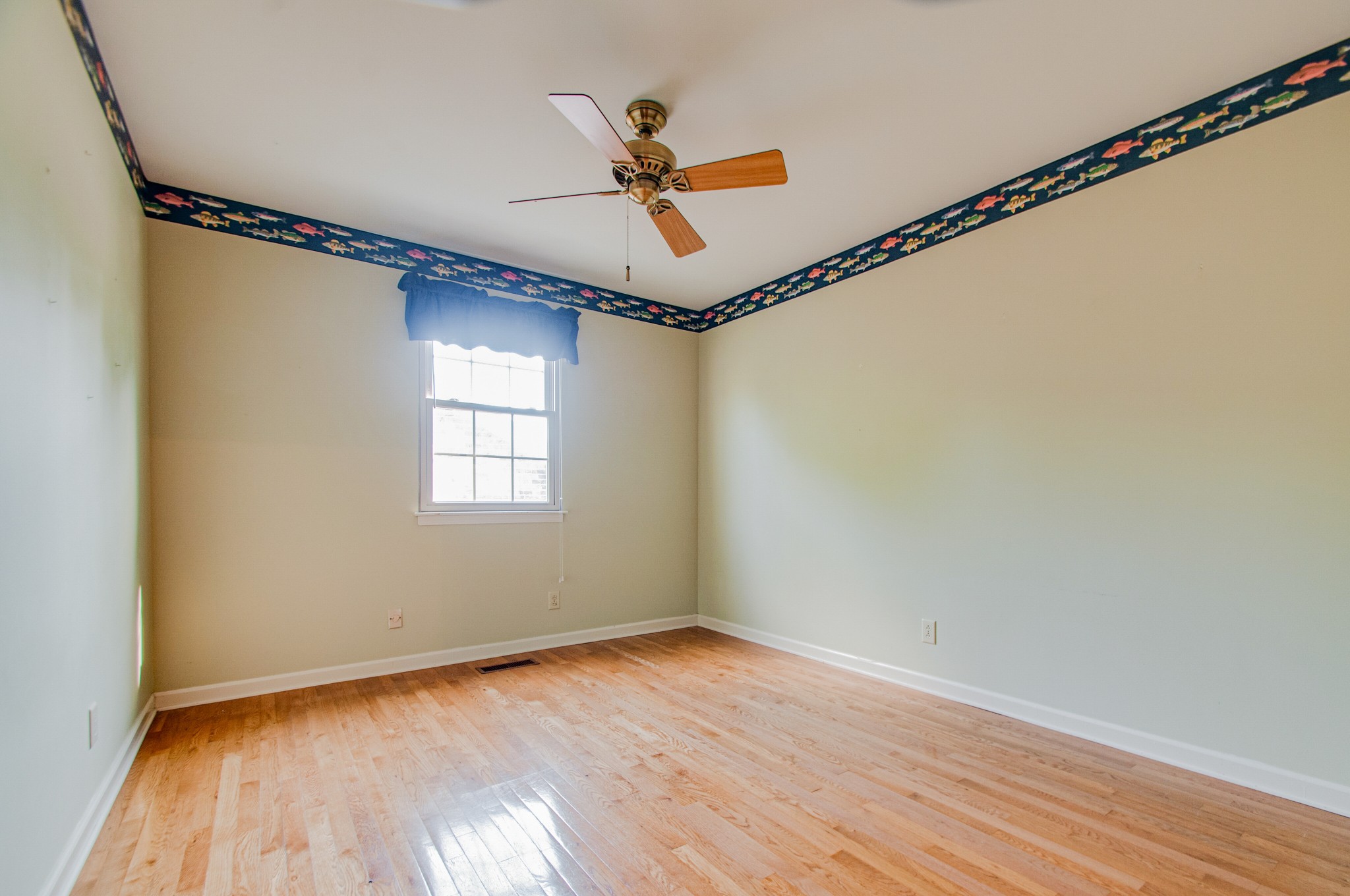 1127 General George Patton Road Nashville, TN 37221 - Photo 26 of 30 a view of a room with wooden floor fan and windows