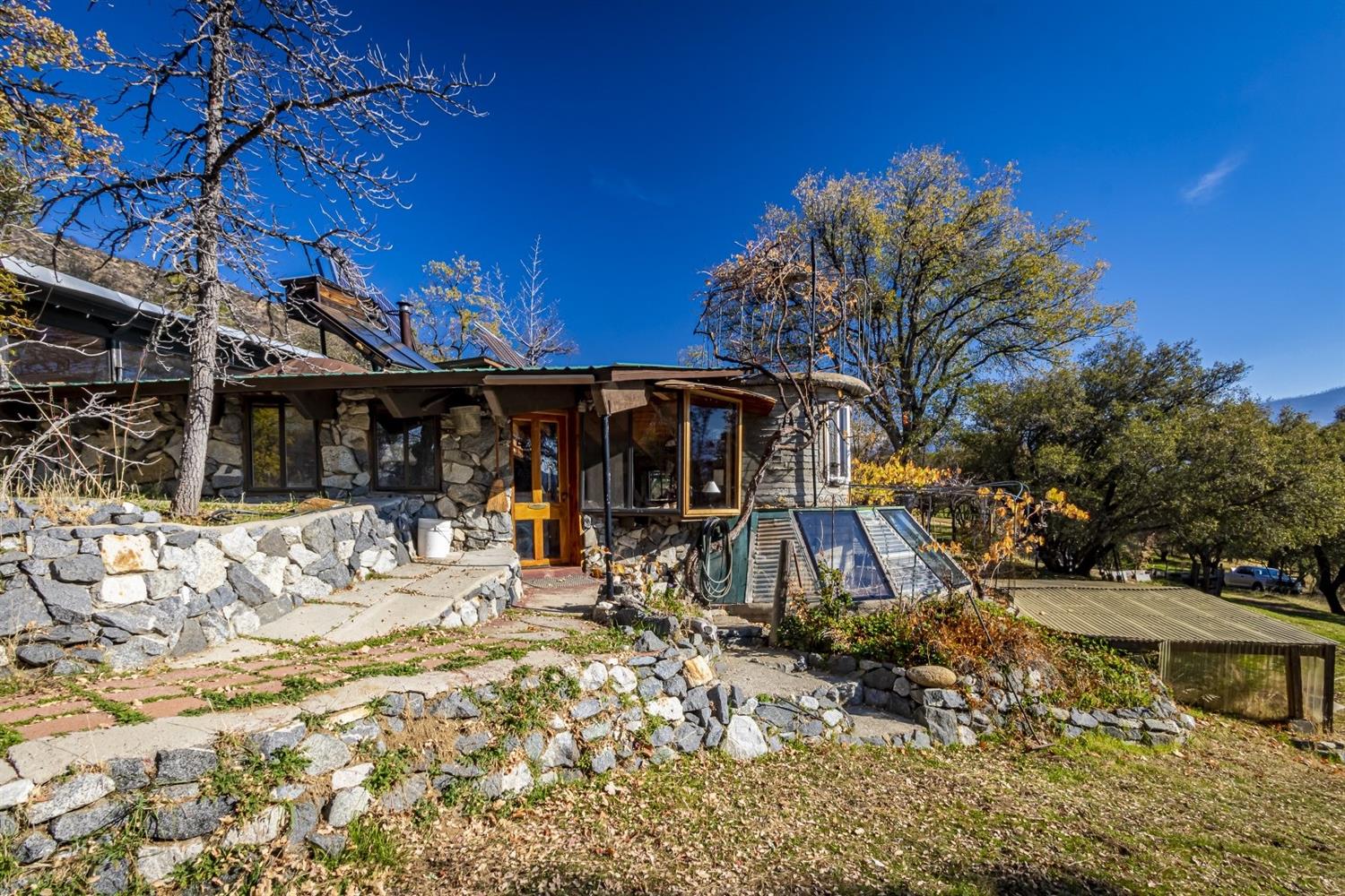 32100 Kinsman Flat Road North Fork, CA 93643 - Photo 4 of 62 a view of a house with a patio