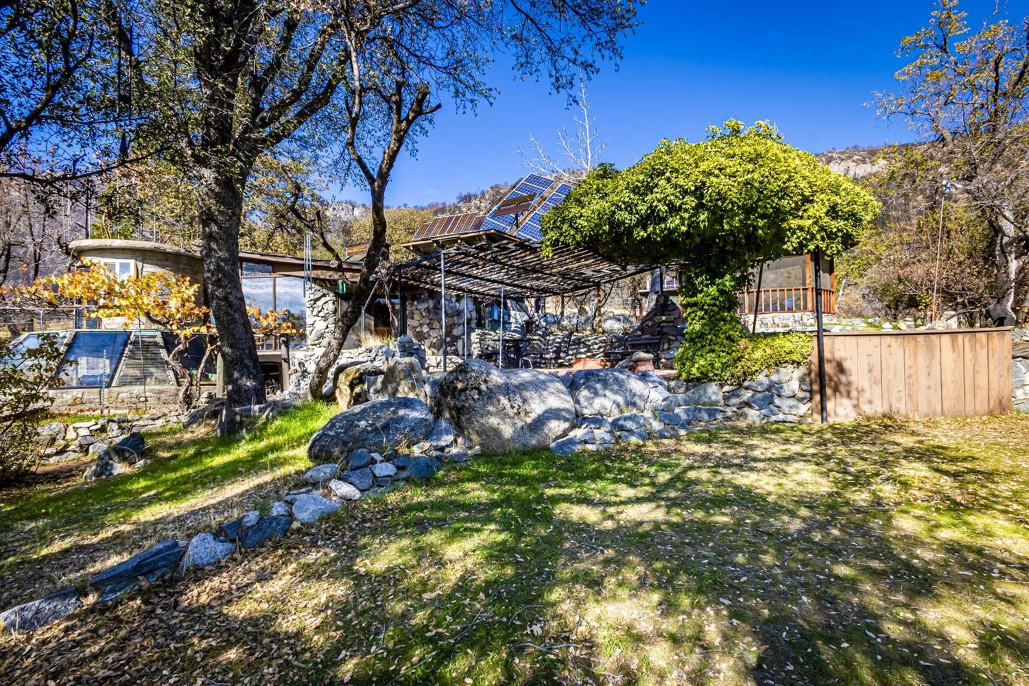 32100 Kinsman Flat Road North Fork, CA 93643 - Photo 36 of 62 a view of a backyard of the house