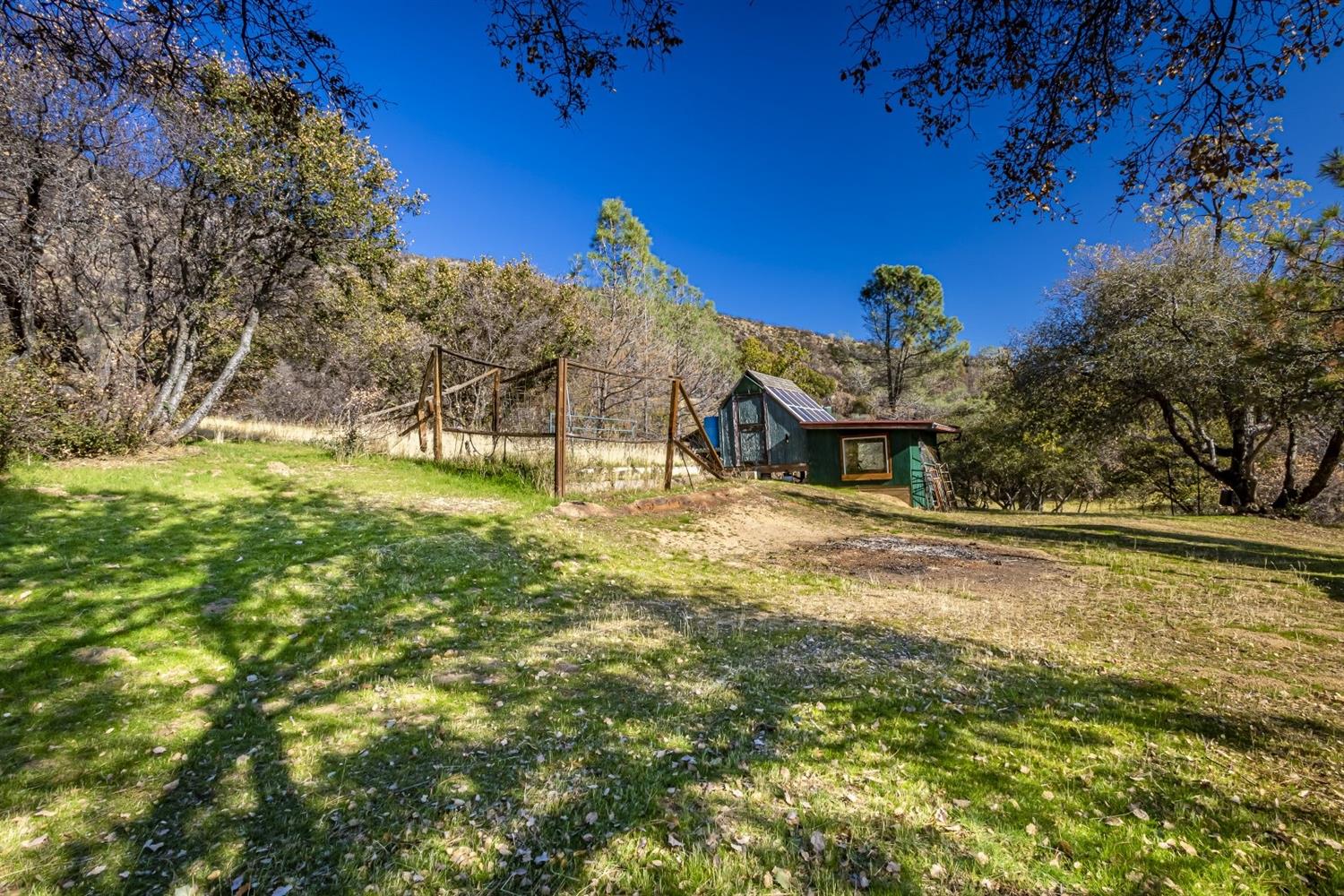 32100 Kinsman Flat Road North Fork, CA 93643 - Photo 37 of 62 a view of a house with a yard