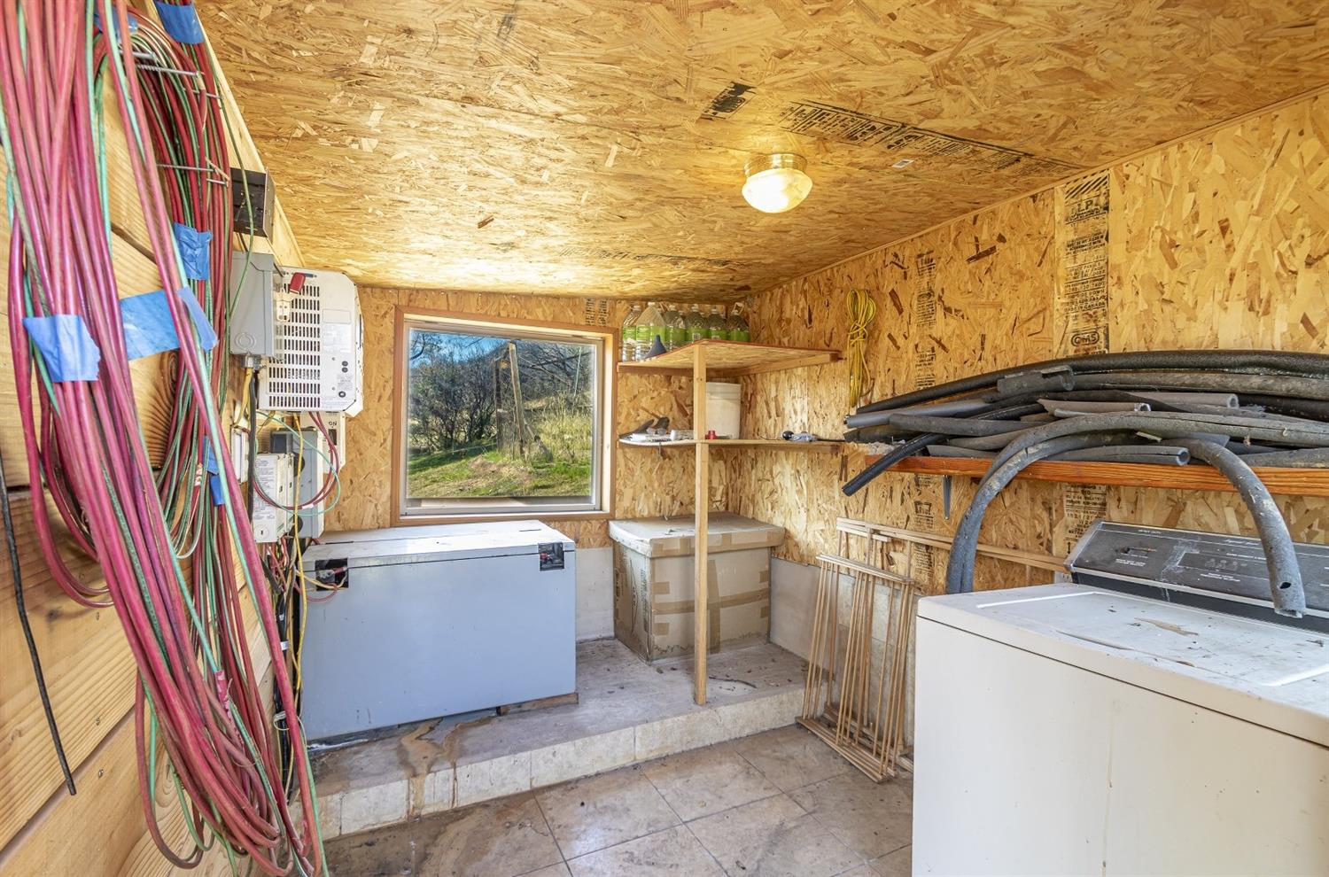 32100 Kinsman Flat Road North Fork, CA 93643 - Photo 40 of 62 a utility room with dryer and washer