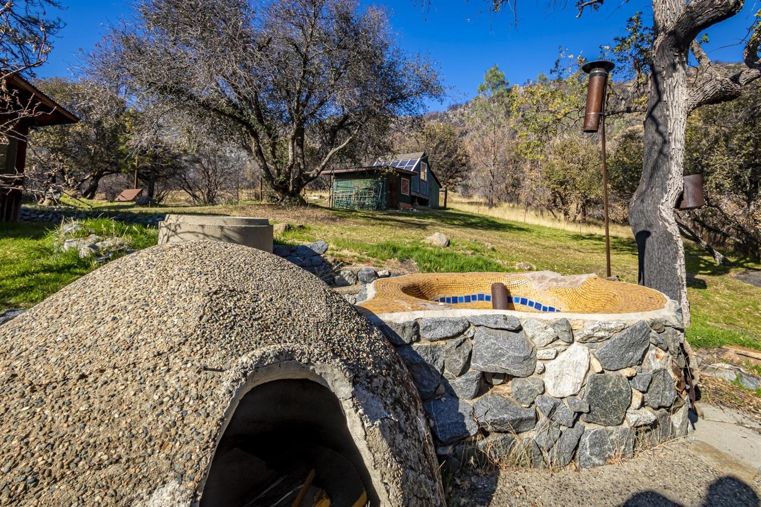 32100 Kinsman Flat Road North Fork, CA 93643 - Photo 42 of 62 a view of swimming pool with a yard