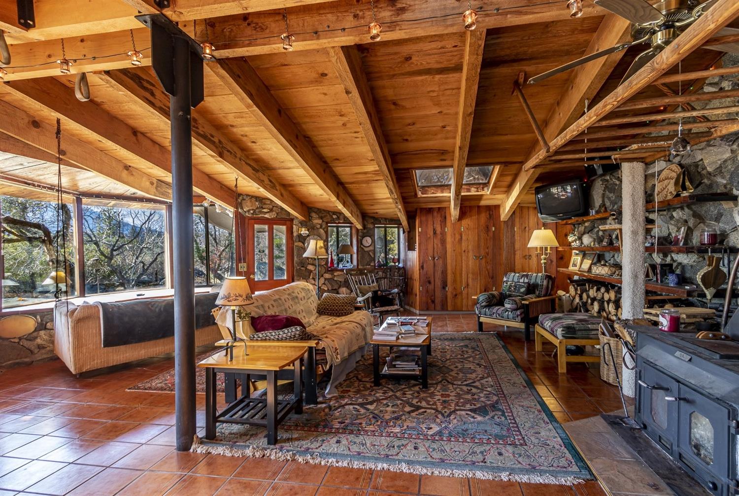 32100 Kinsman Flat Road North Fork, CA 93643 - Photo 6 of 62 a view of a chairs and table in the patio