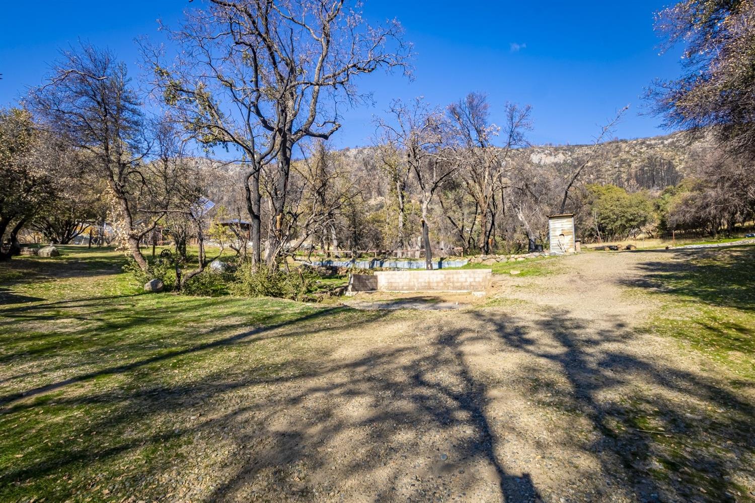 32100 Kinsman Flat Road North Fork, CA 93643 - Photo 51 of 62 a view of road with large trees
