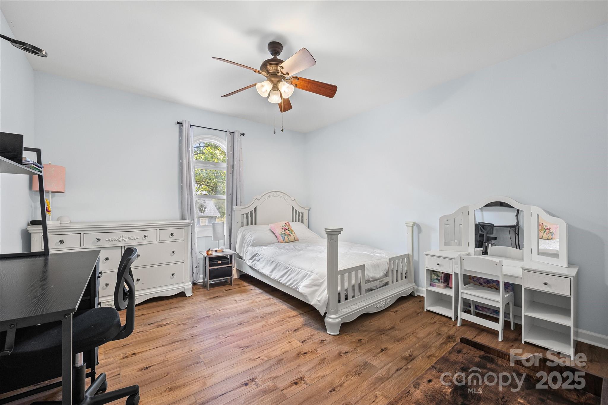 9013 Windjammer Drive Tega Cay, SC 29708 - Photo 13 of 20 a bedroom with furniture and a wooden floor