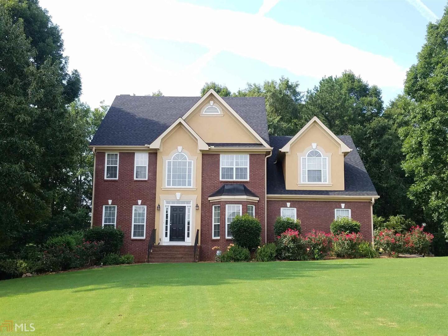128 Fairoaks Circle Stockbridge, GA 30281 - Photo 1 of 1 Front
