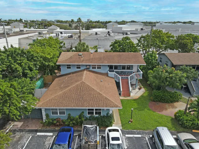 an aerial view of a house with a garden