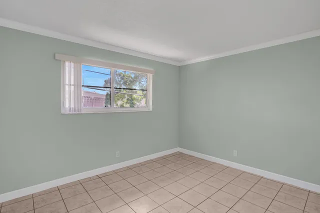 a view of a room that has a window in it