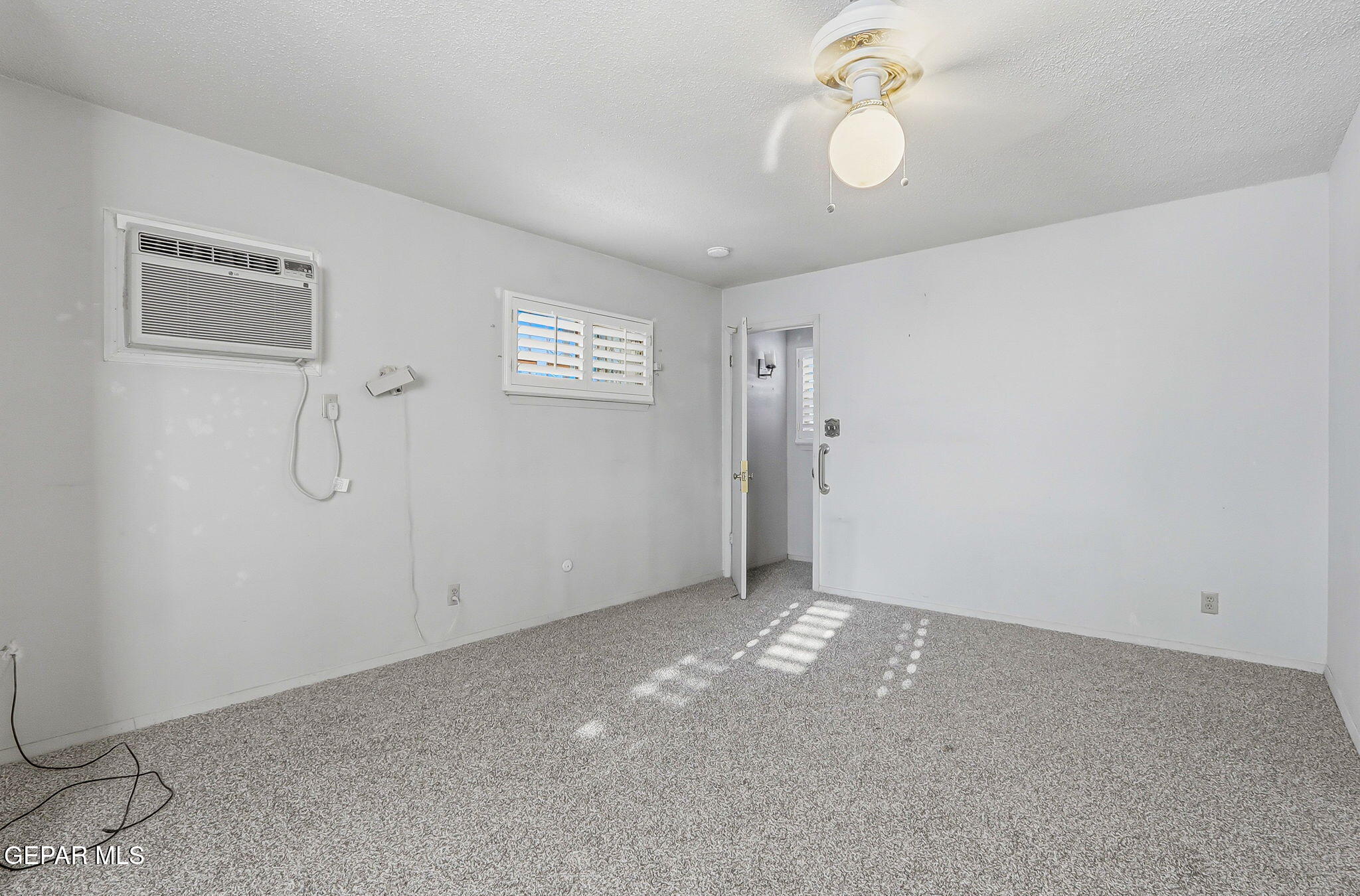 3212 Donegal Road El Paso, TX 79925 - Photo 26 of 37 a view of an empty room with a window