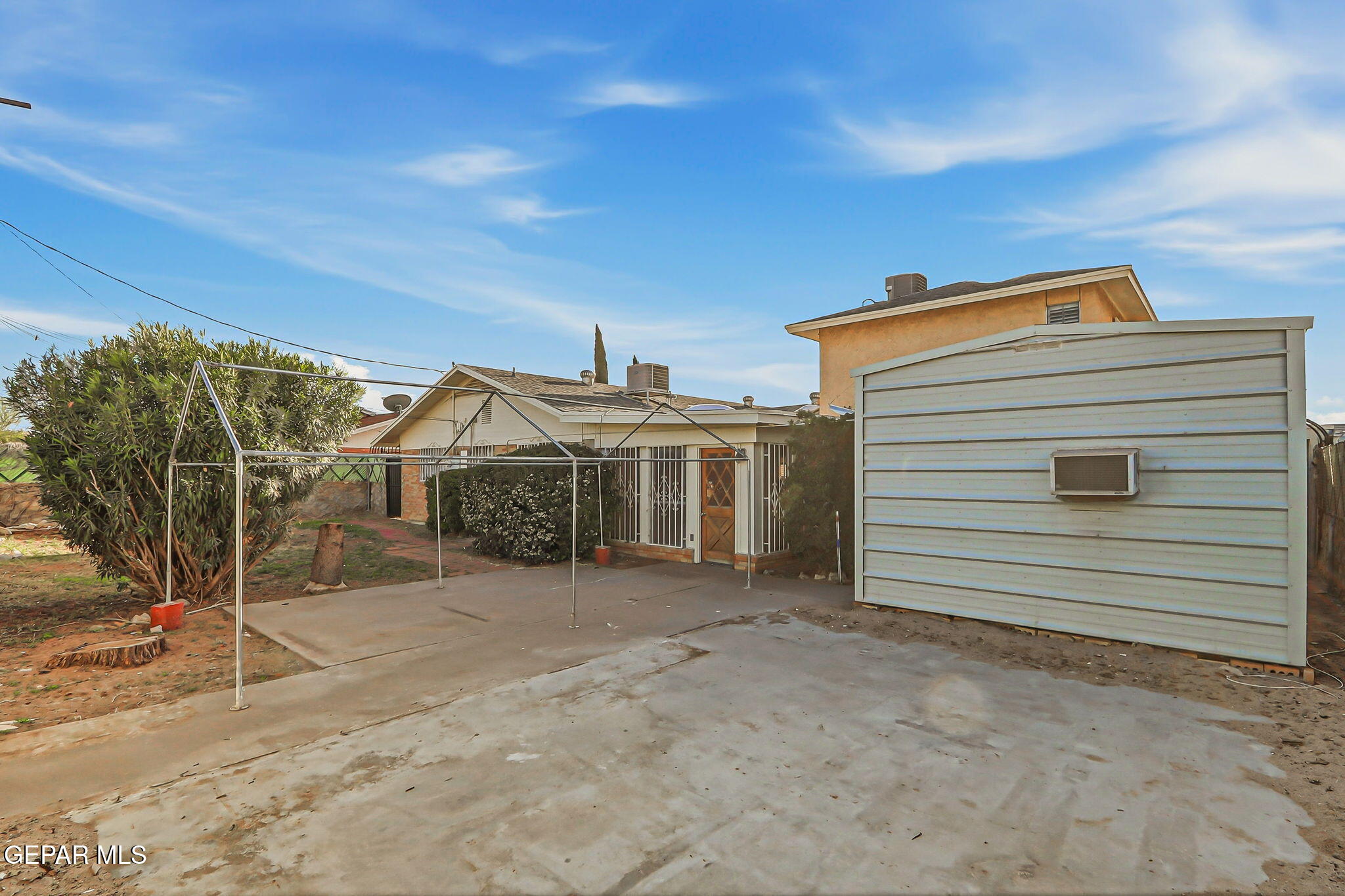 3212 Donegal Road El Paso, TX 79925 - Photo 35 of 40 a view of a house with a backyard