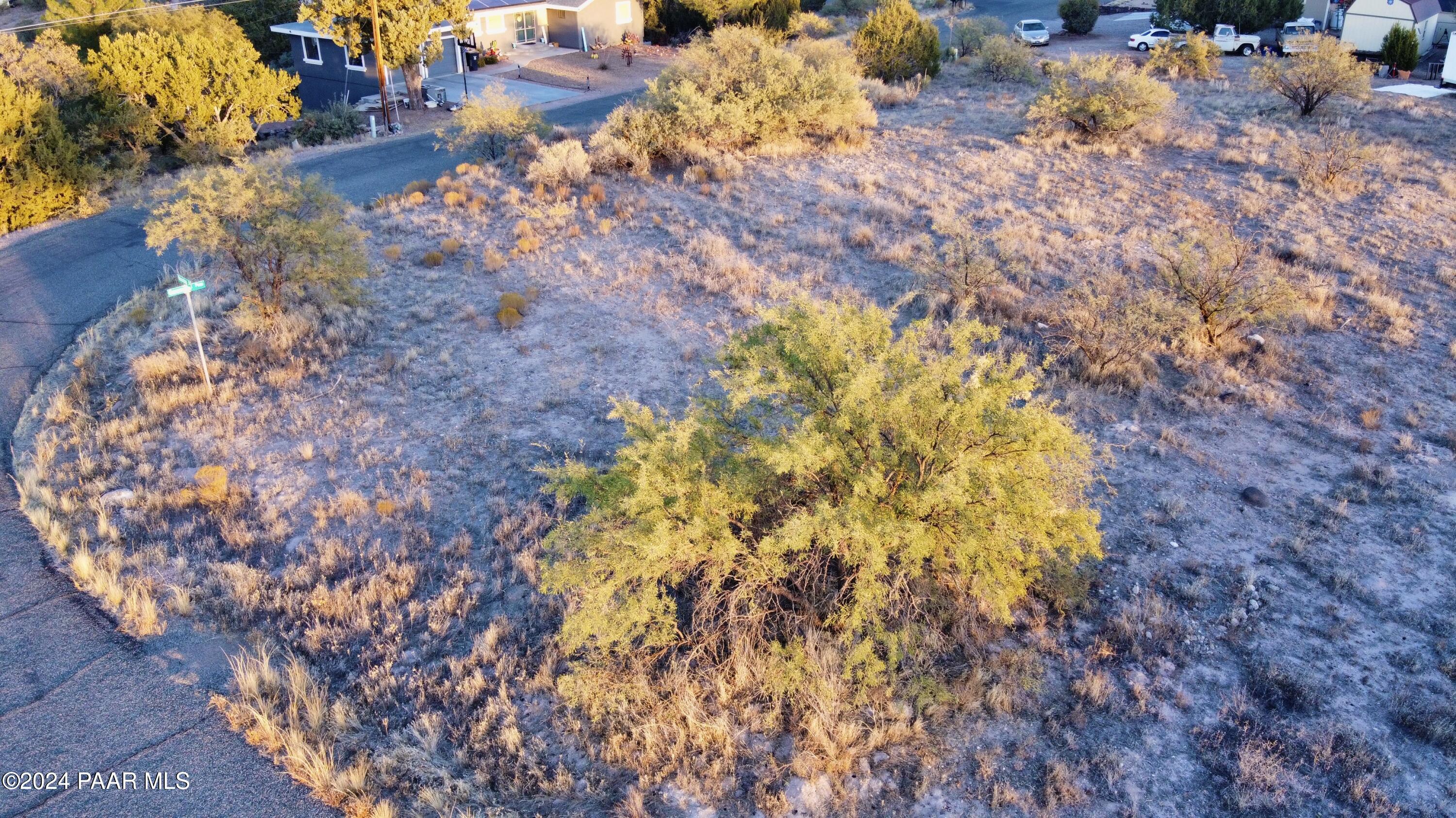 4605 East Gunsmoke Pass Rimrock, AZ 86335 - Photo 13 of 16 a backyard of a house
