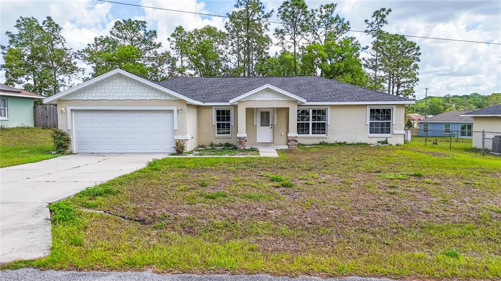 5 Pecan Pass Ocala, FL 34472 - Photo 1 of 1 a view of a house with a yard