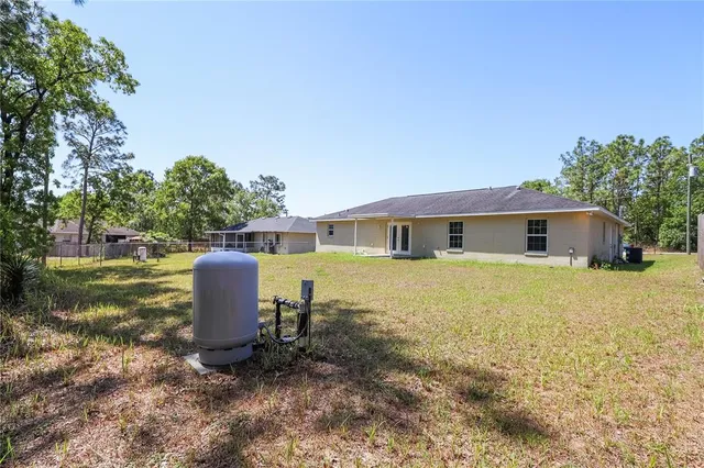 a front view of house with yard and seating area