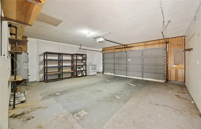 a view of a garage with walk in closet