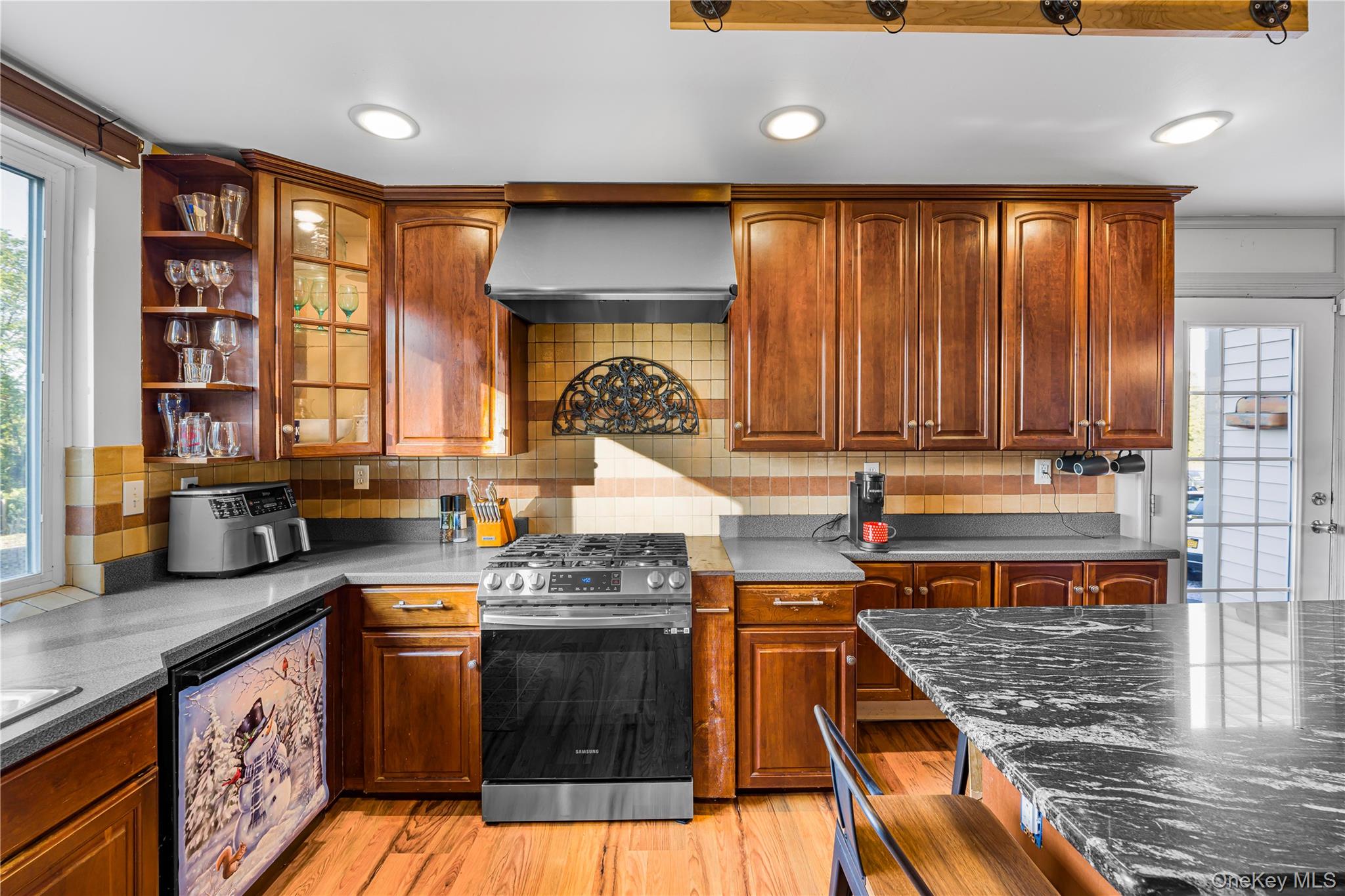 17 Brendella Court Wallkill, NY 12589 - Photo 7 of 42 Kitchen featuring plenty of natural light, gas range, decorative backsplash, and recessed lighting