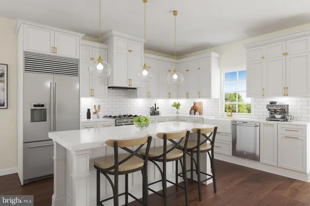 a kitchen with stainless steel appliances granite countertop a white cabinets and wooden floor