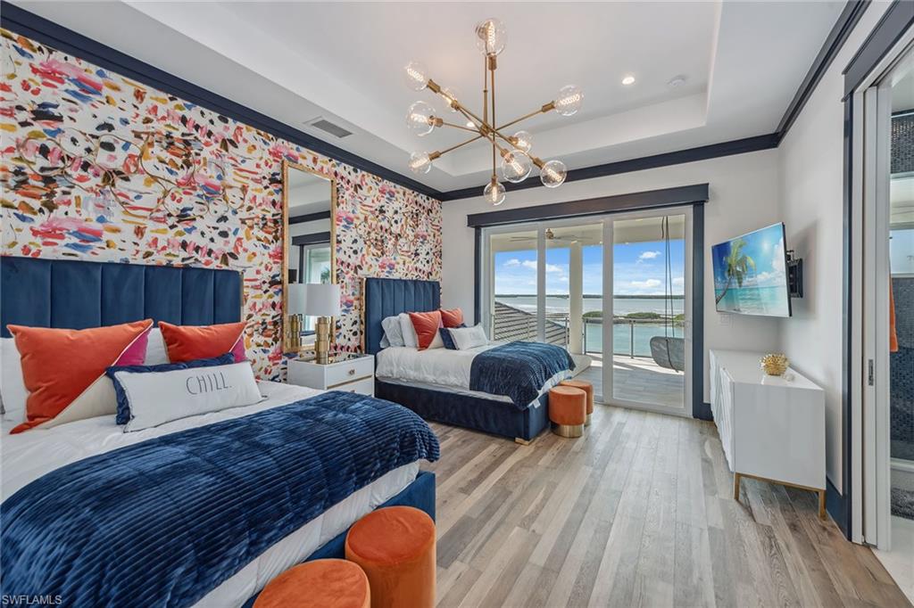 1829 South Inlet Drive Marco Island, FL 34145 - Photo 24 of 46 a living room with furniture and a large window