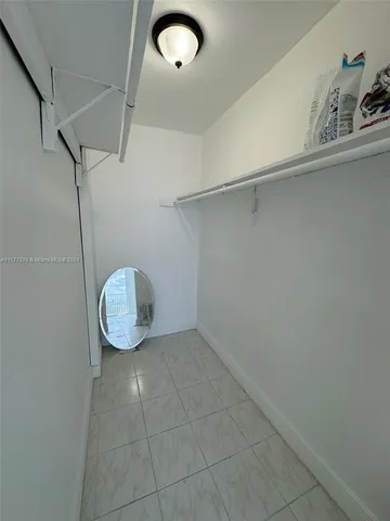 a front view of a house with parking space