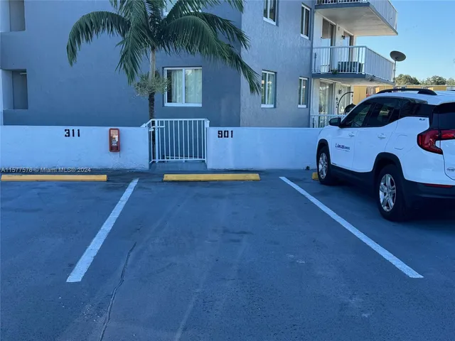 a view of a swimming pool with a lounge chairs