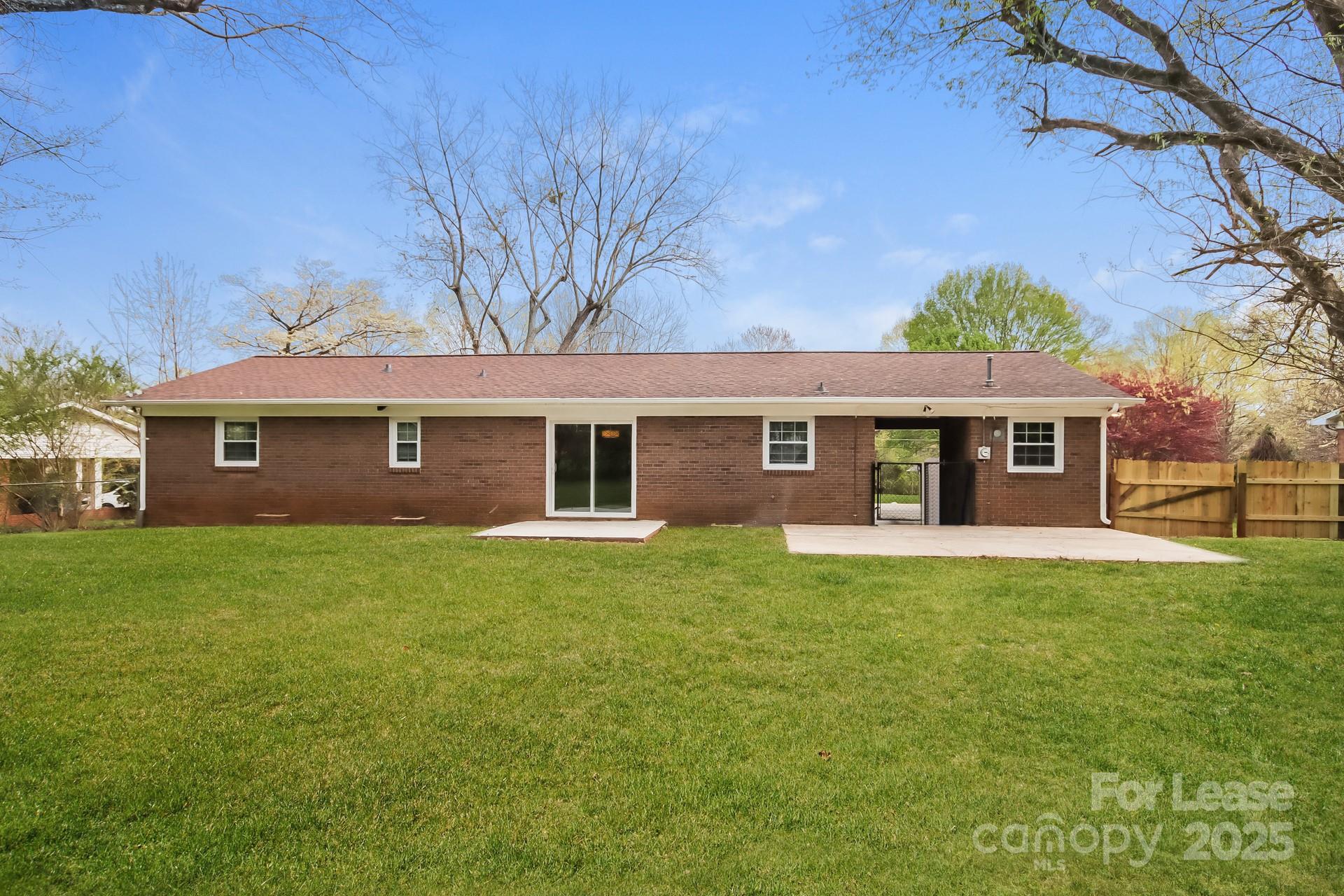1135 Carolina Circle Statesville, NC 28677 - Photo 14 of 16 front view of a house with a yard