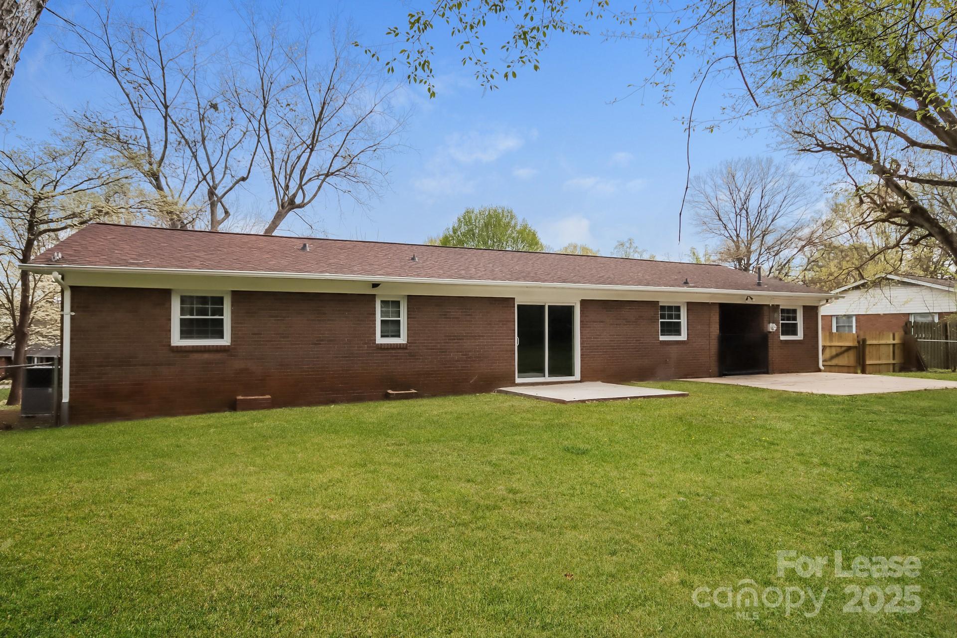 1135 Carolina Circle Statesville, NC 28677 - Photo 15 of 16 a front view of a house with garden