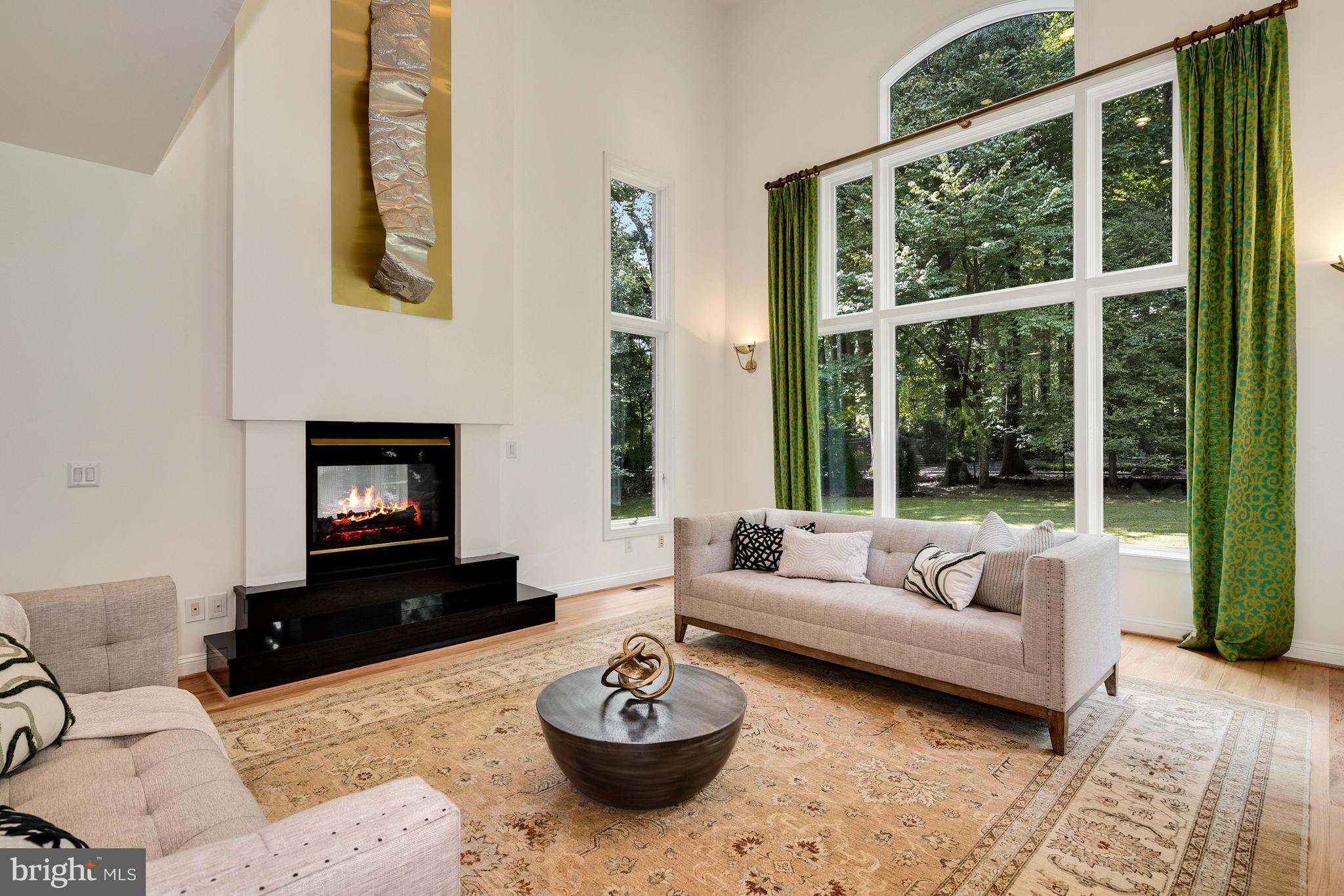 10121 Glen Road Potomac, MD 20854 - Photo 19 of 70 Family room shares gas fireplace w/ office