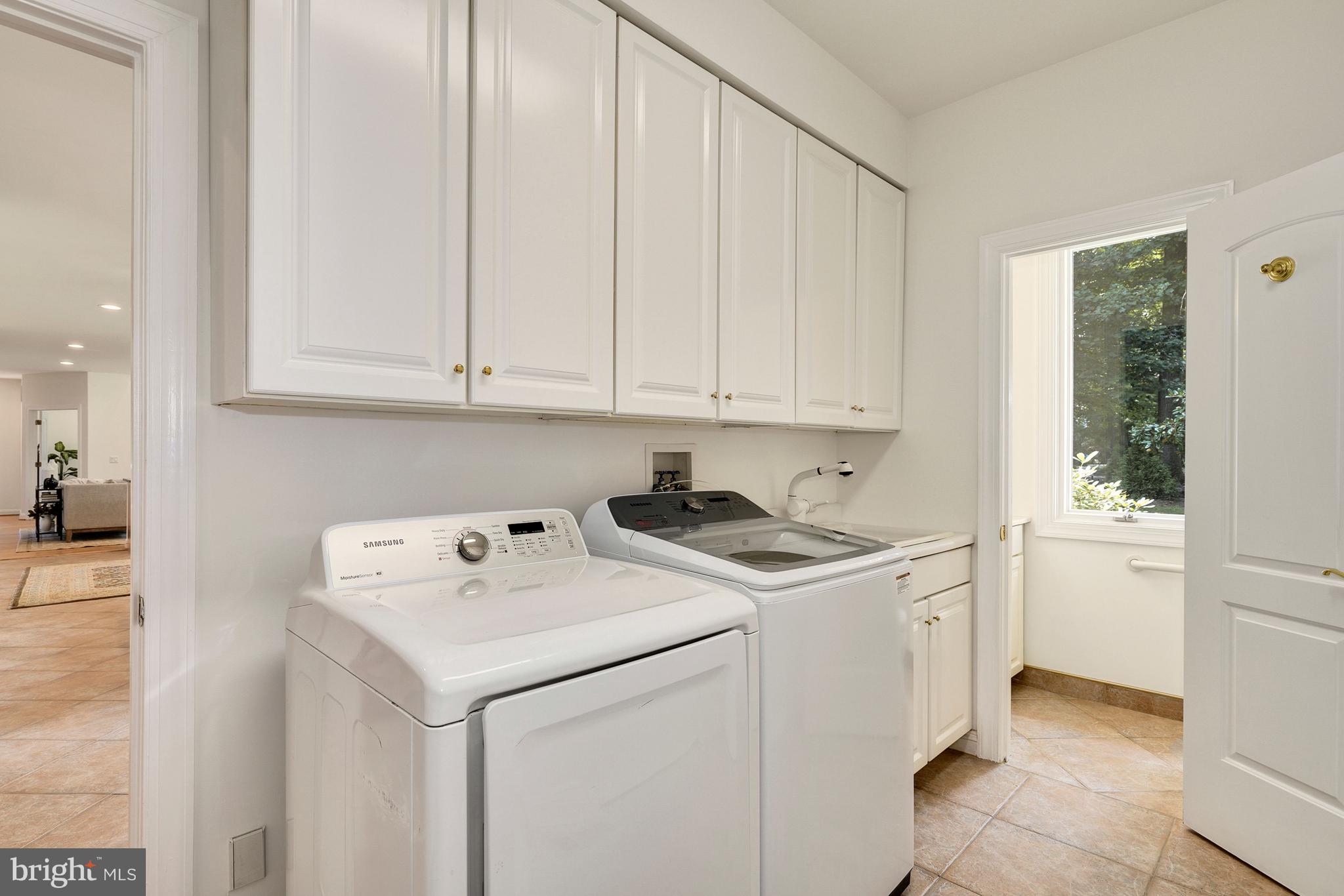 10121 Glen Road Potomac, MD 20854 - Photo 32 of 70 Laundry/mud room with cabinetry