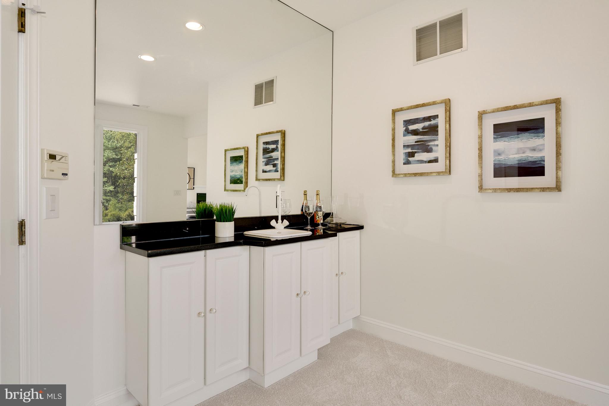 10121 Glen Road Potomac, MD 20854 - Photo 39 of 70 Owner's Suite with wet bar