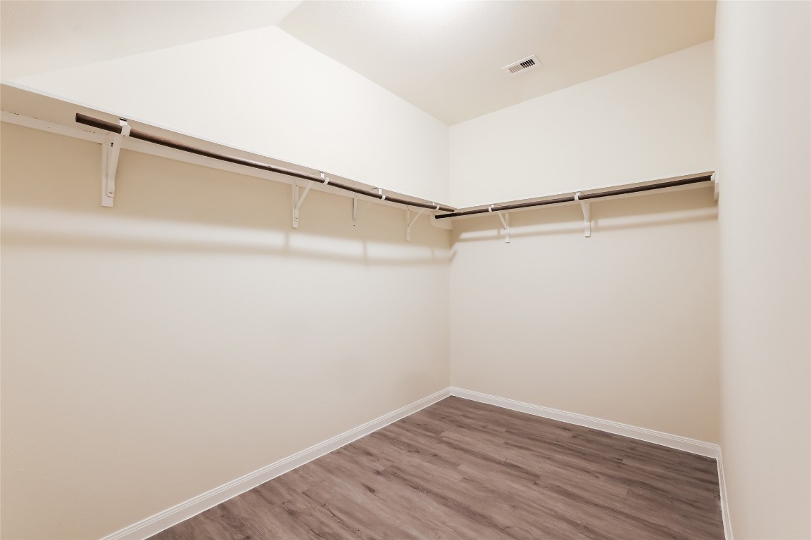 12330 Roy Mix Bohn Lane Houston, TX 77044 - Photo 12 of 17 a view of an empty walk in closet